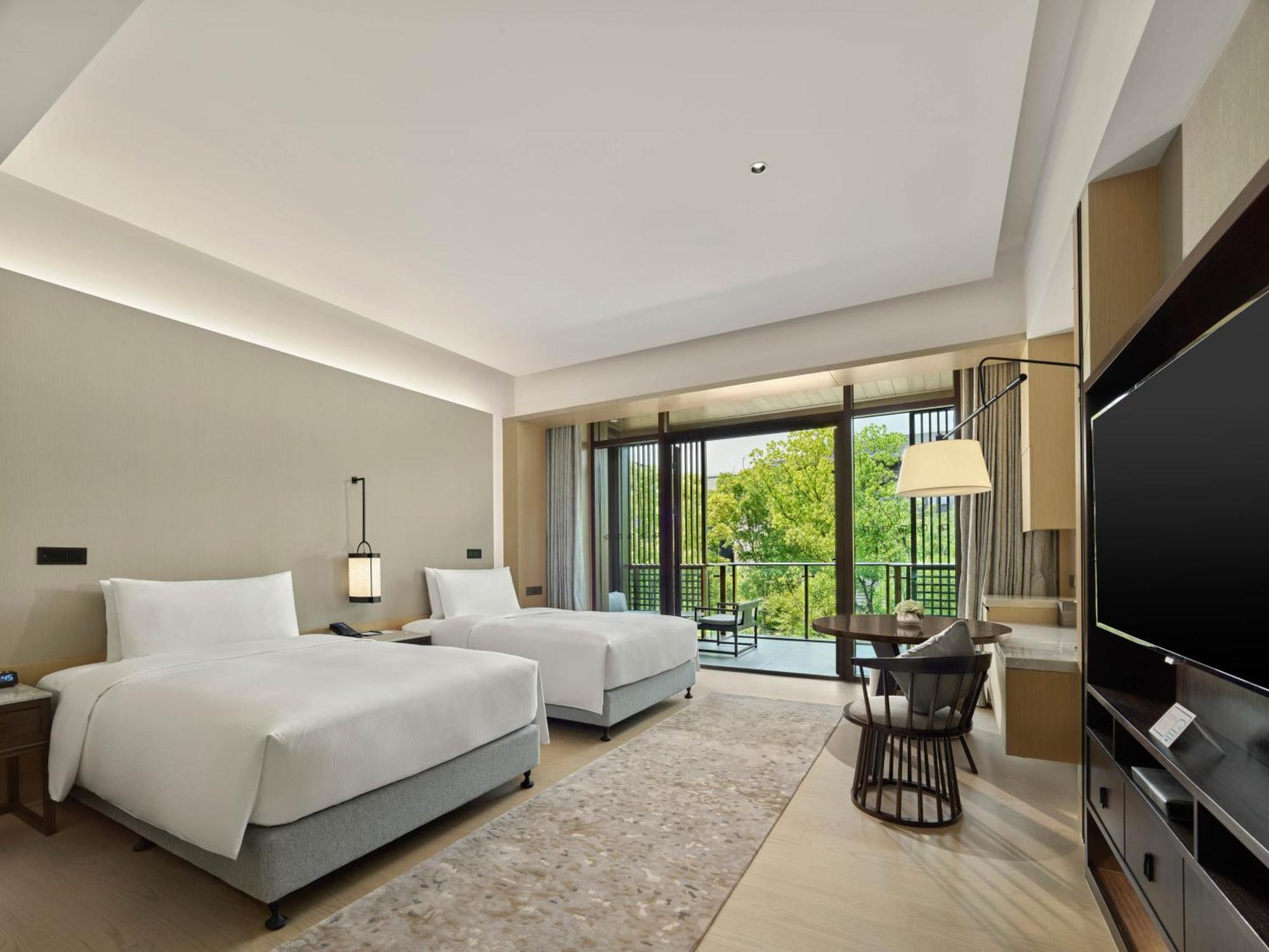 Hilton Shanghai Songjiang Guangfulin Exteriör bild